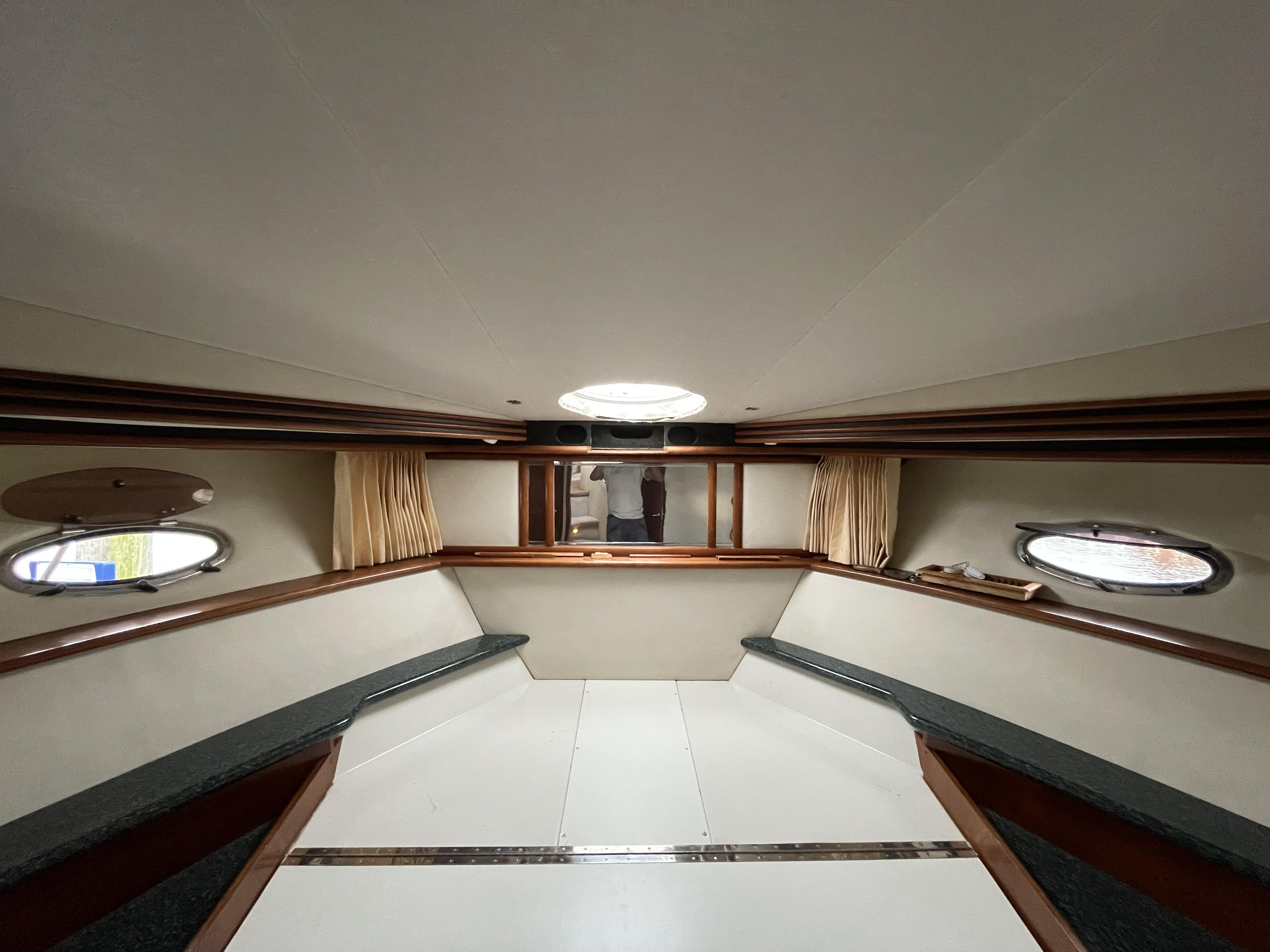 Fabric acoustic wall panels integrated into a yacht interior