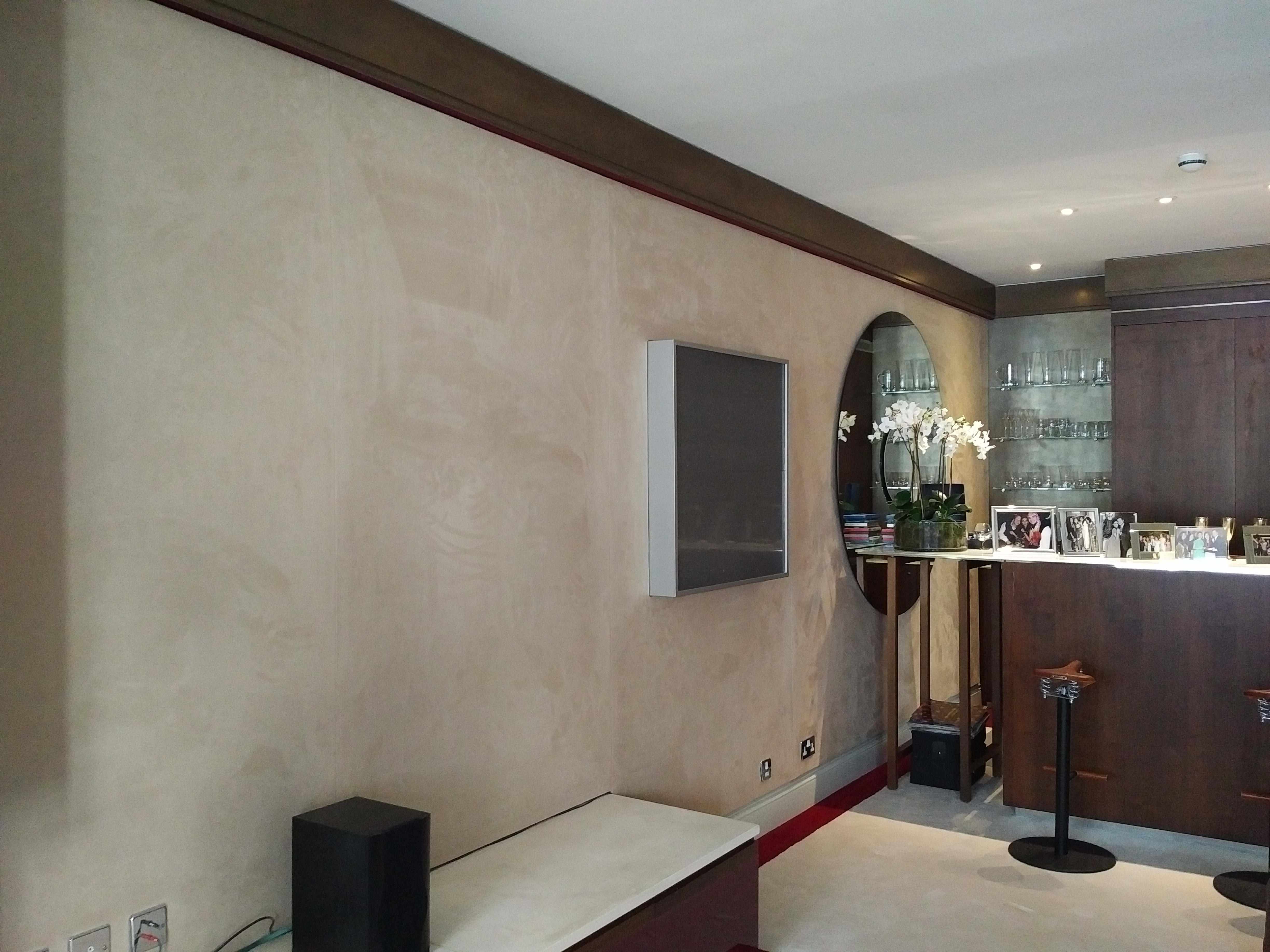 Modern dining booth with a premium upholstered finish, illustrating a specialist architectural acoustic surface