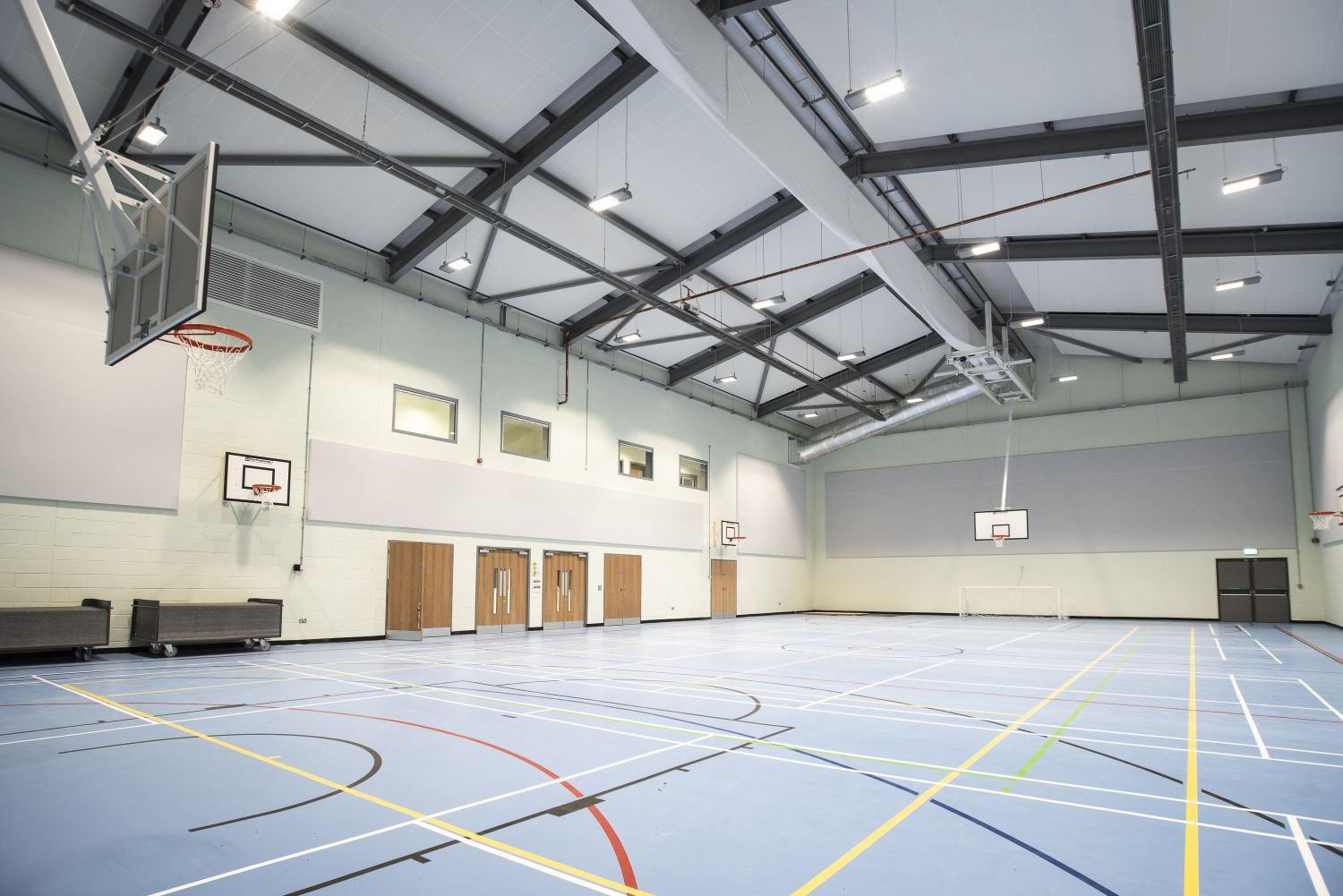 Optimum Engineered acoustic wall panels installed in a sports hall